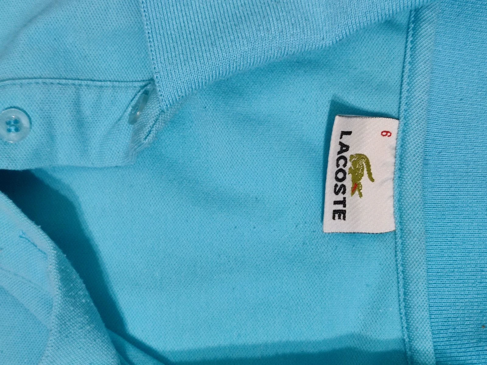 Vintage Lacoste polohemd lichtblauw met zak Maat 6 (XL) – photo 4